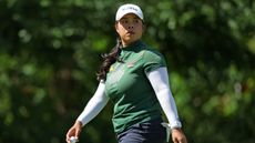 Arpichaya Yubol looking at something while walking on the LPGA Tour