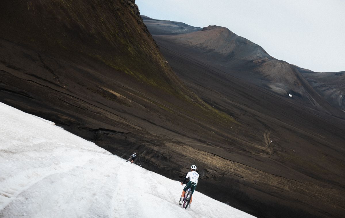Riders cross snow and ice across the vast open landscapes of South Iceland