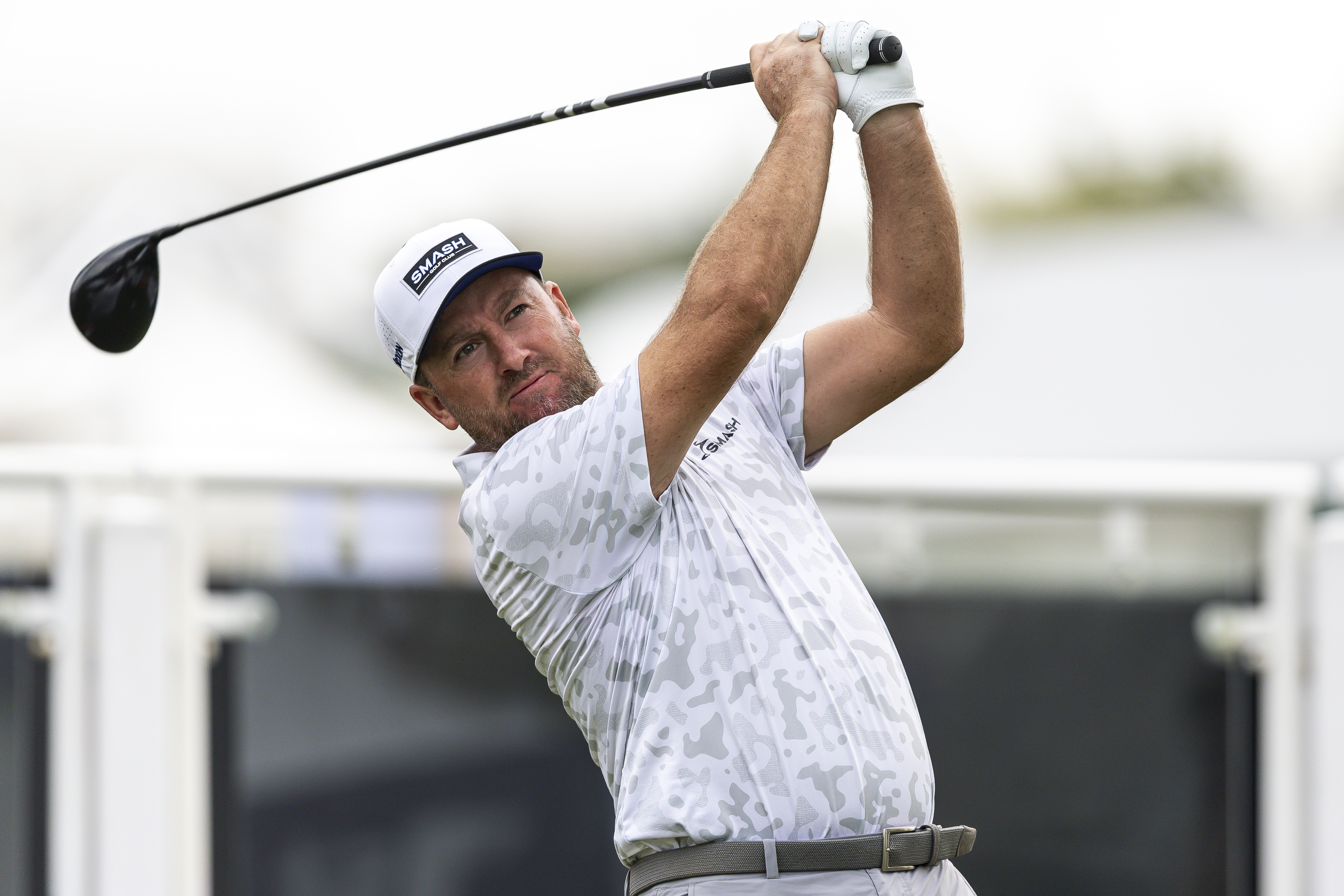 Graeme McDowell holds his finish on a drive