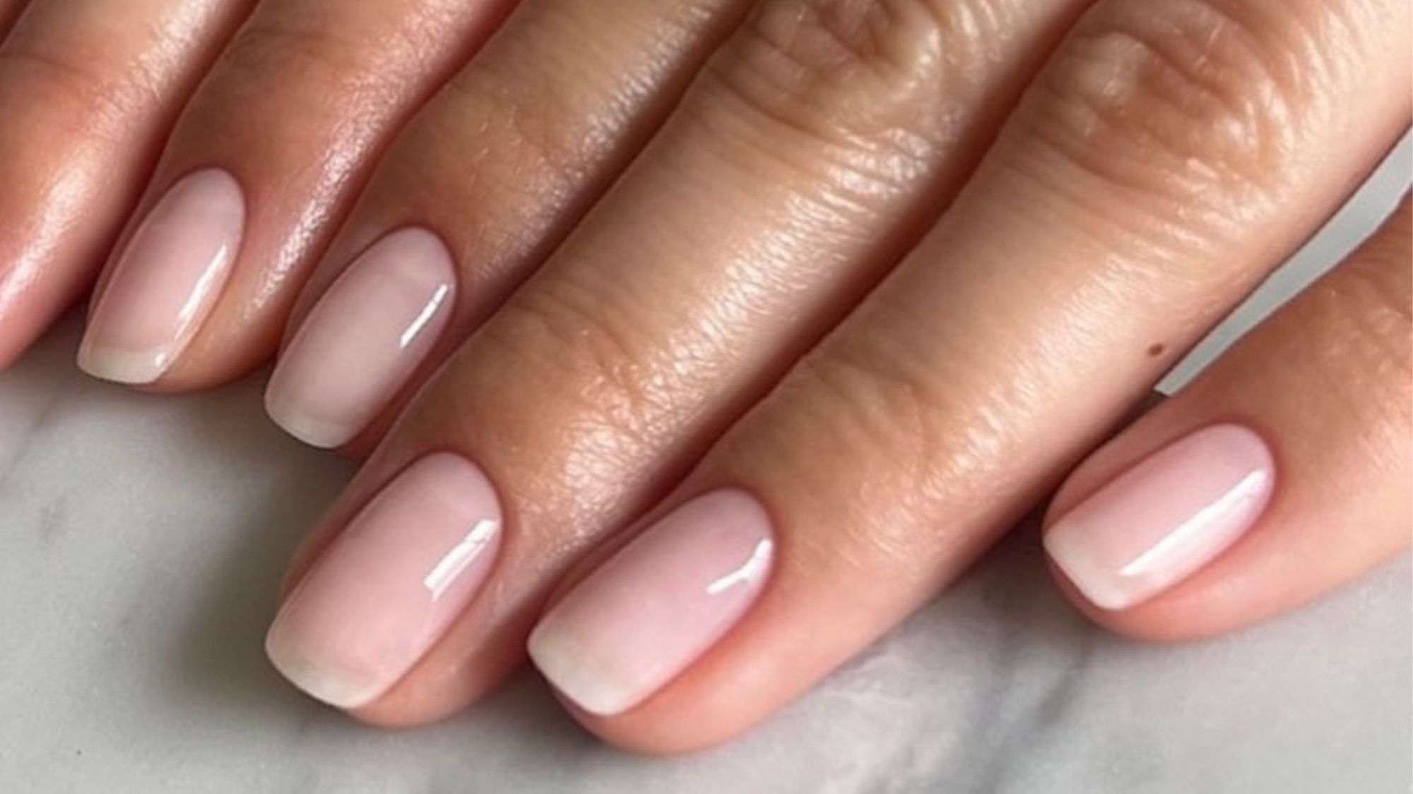 Nails by Rae London nails using the best nude base coats