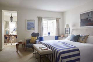 Bedroom in Tresanton hotel with blue and white stripe bedspread
