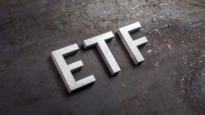 High Angle View Of Etf Text On Table 