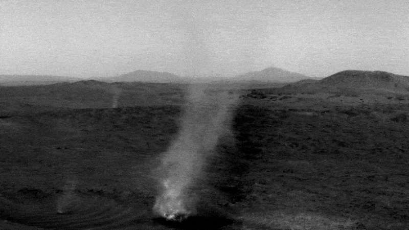 Looped video footage of two dust devils merging on Mars