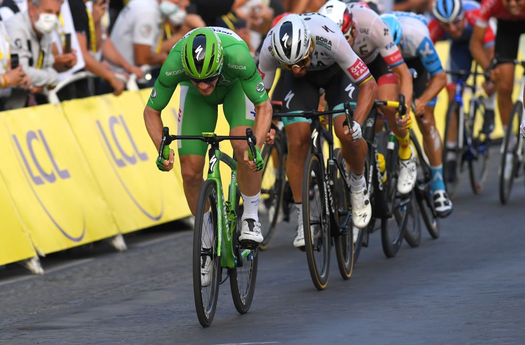 PARIS FRANCE SEPTEMBER 20 Sprint Arrival Sam Bennett of Ireland and Team Deceuninck QuickStep Green Points Jersey Peter Sagan of Slovakia and Team Bora Hansgrohe Alexander Kristoff of Norway and UAE Team Emirates during the 107th Tour de France 2020 Stage 21 a 122km stage from MantesLaJolie to Paris Champslyses TDF2020 LeTour on September 20 2020 in Paris France Photo by Tim de WaeleGetty Images