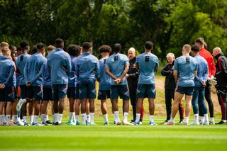 Manager Erik ten Hag of Manchester United talks to players during a first team training session at Carrington Training Ground on June 27, 2022 in Manchester, England.