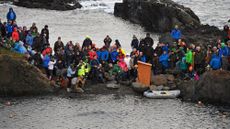 People compete in the World Stone Skimming Championships