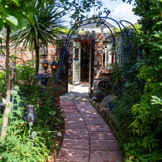 B&Q Gardener of the Year Odette and Rob's zoned garden archway over garden path