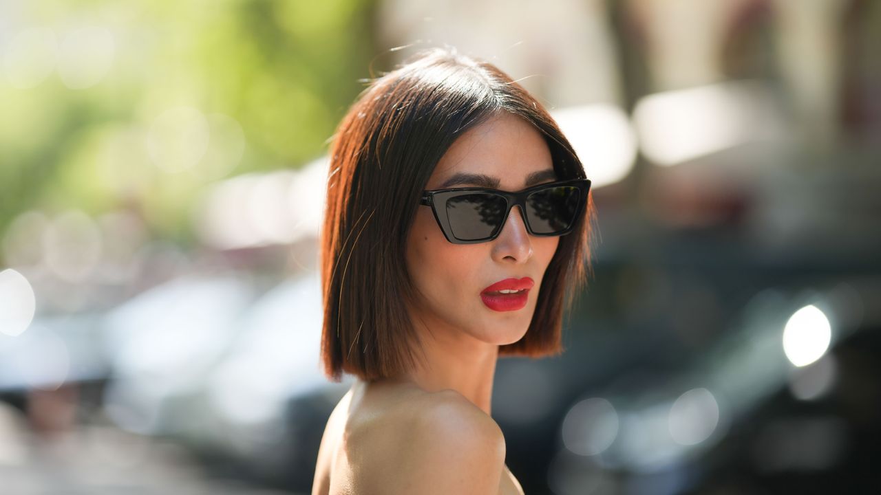 Heart Evangelista wears black cat eyes sunglasses from Saint Laurent, outside Ashi Studio, during the Haute Couture Fall/Winter 2023/2024 as part of Paris Fashion Week on July 06, 2023 in Paris, France. 