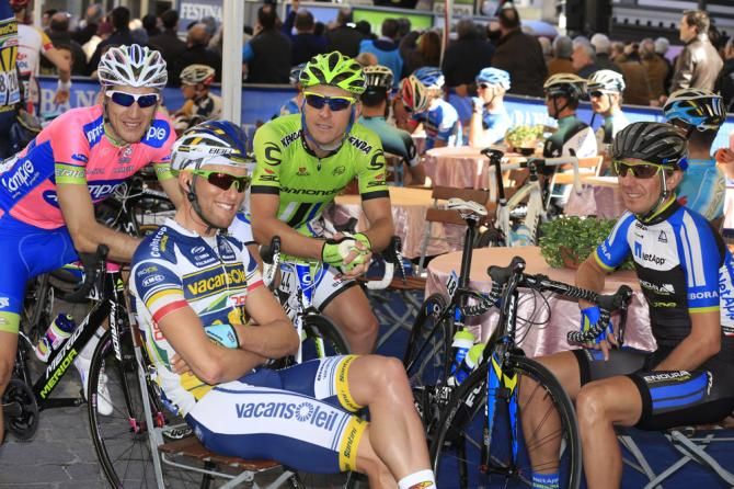 Riders relax before the start of stage 5