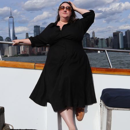 Sarah Chiwaya styling a black linen dress with boat shoes
