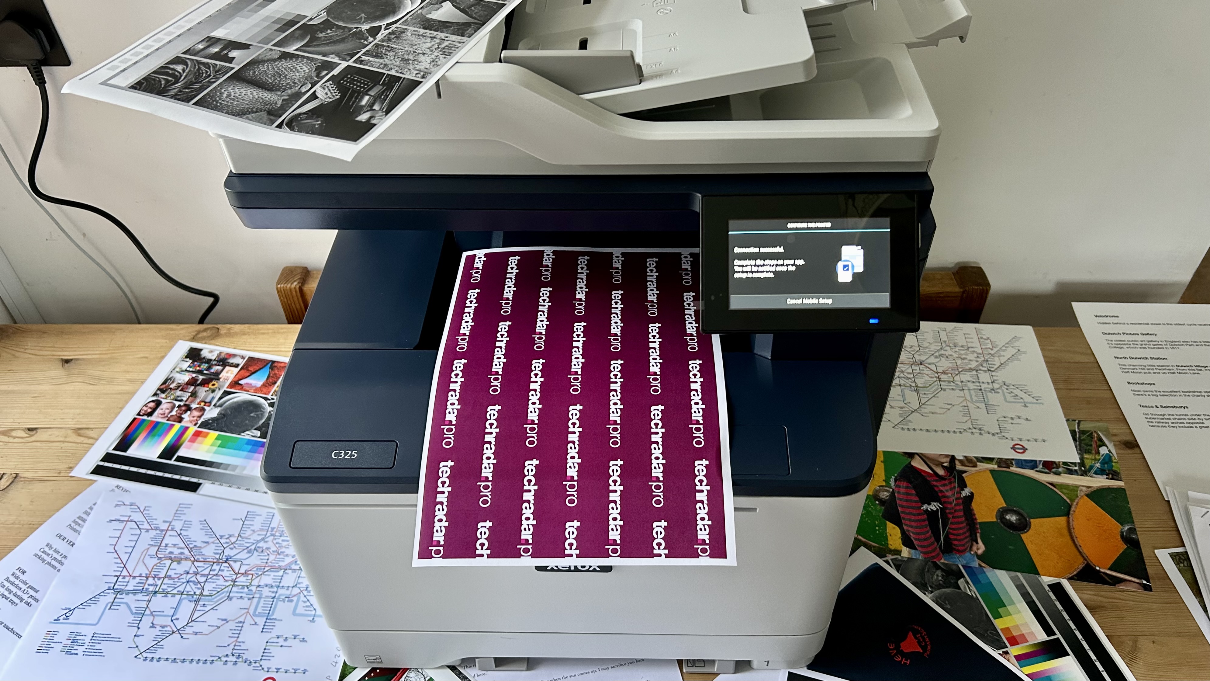 Xerox C325 laser printer in a home office during our testing