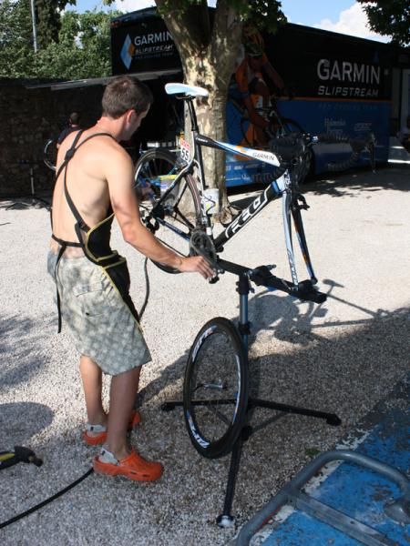 Garmin-Slipstream team mechanic Tom Hopper gets to work making sure the bike of Martijn Maaskant is clean and shiny for the next of service.