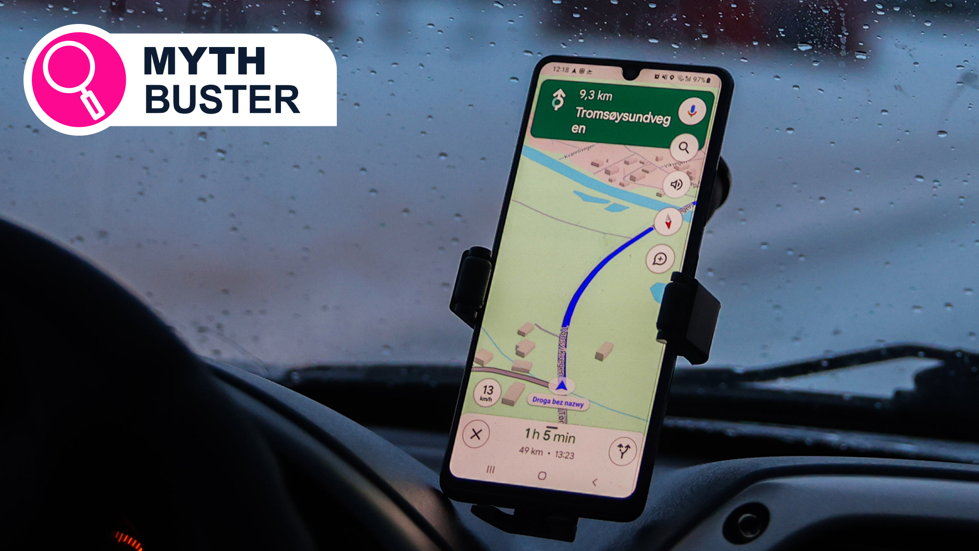 A phone showing Google Maps mounted to a car dashboard
