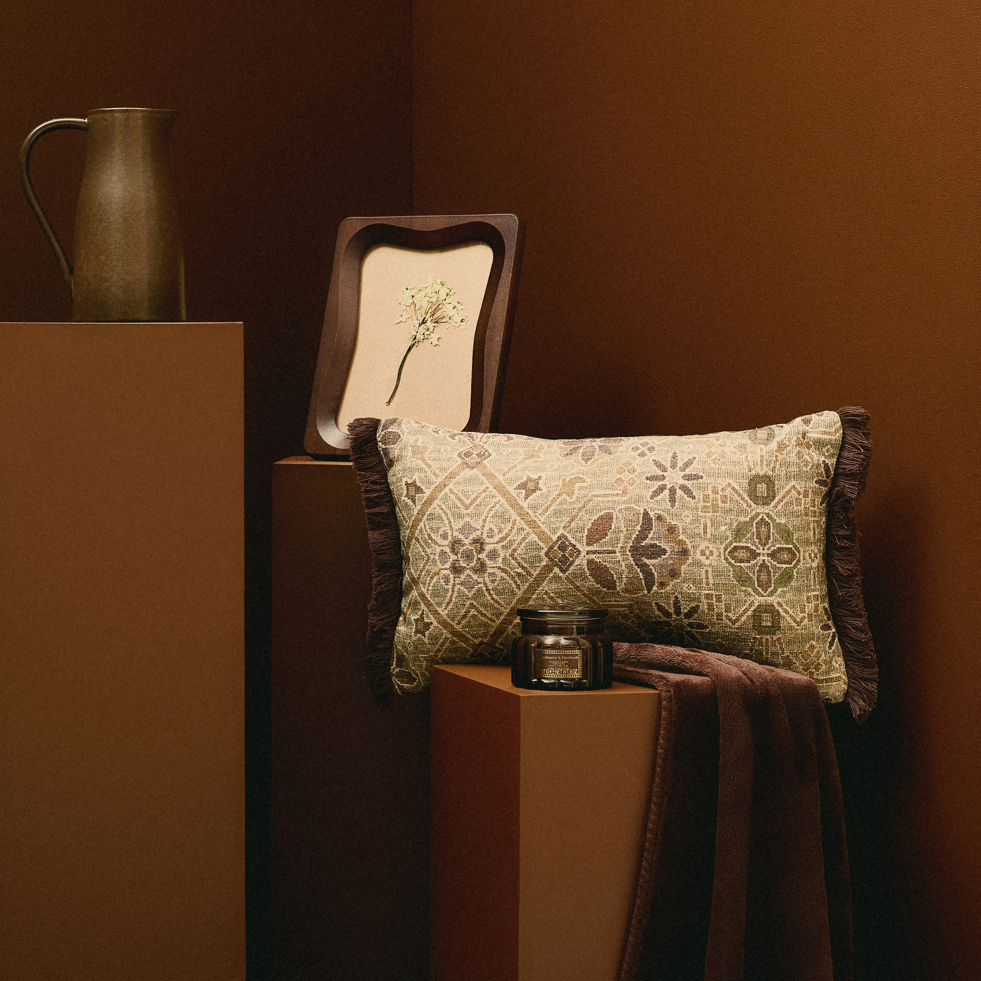 jug, photo frame and cushion.