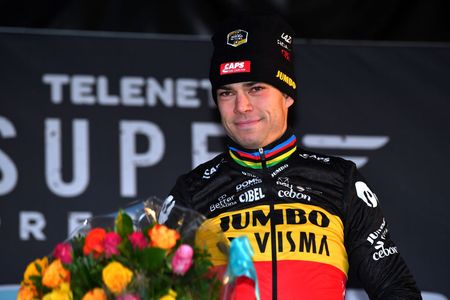 BOOM BELGIUM DECEMBER 04 Wout Van Aert of Belgium and Team Jumbo Visma celebrates at podium as race winner after the 7th Superprestige Cyclocross Boom 2021 Mens Elite SPBoom Superprestige2022 on December 04 2021 in Boom Belgium Photo by Luc ClaessenGetty Images