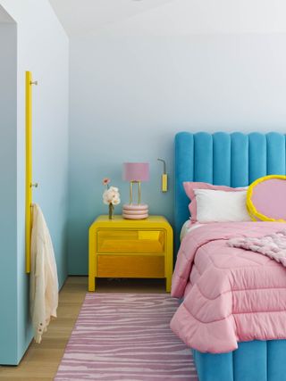 pink blue and yellow bedroom