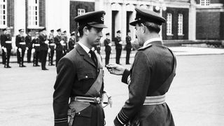 Prince Charles receiving his pilots wings from Air Chief Marshal Sir Denis Spotswood at the RAF College in Cranwell