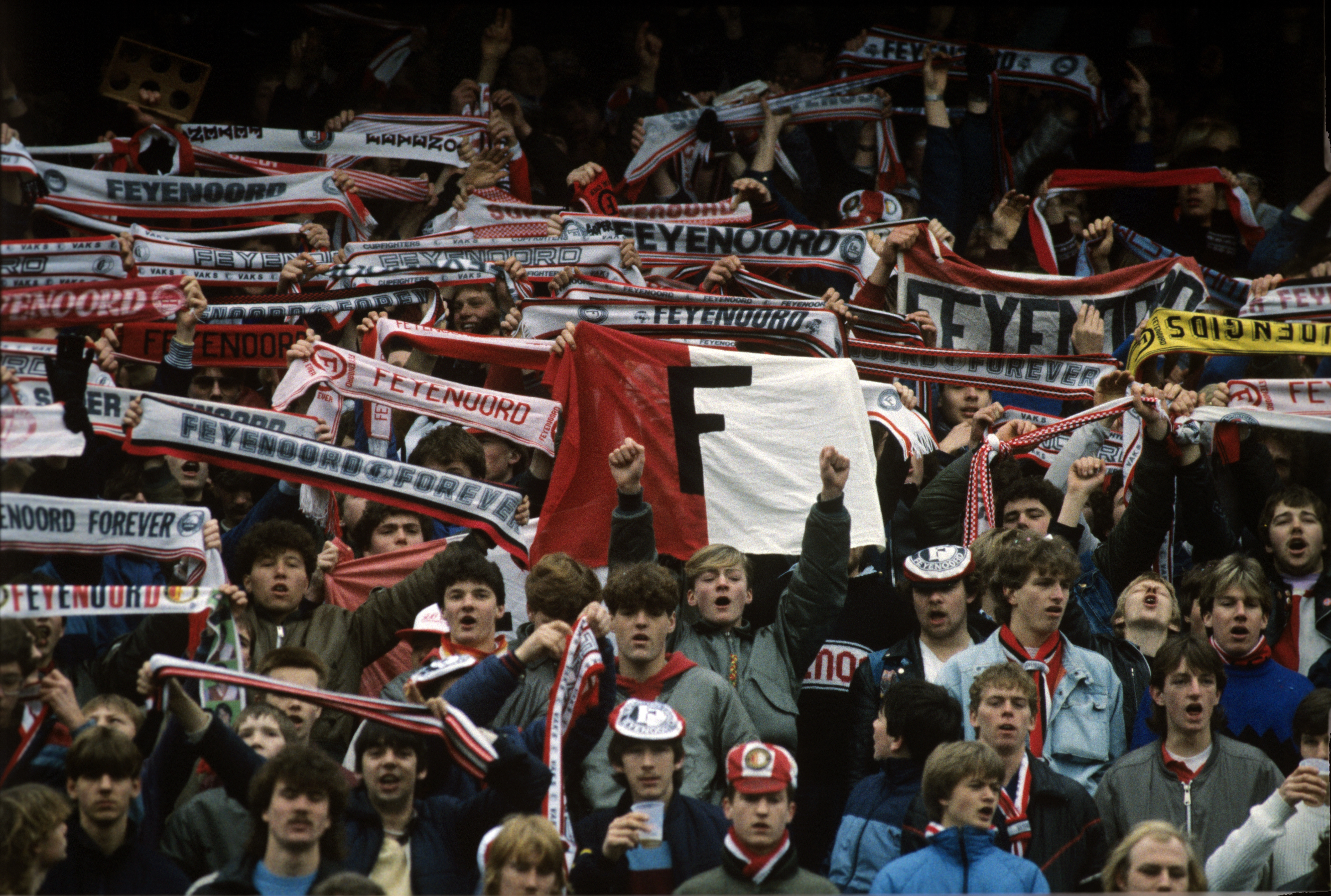 Feyenoord fans cheer on their team during a derby against Ajax in February 1984.