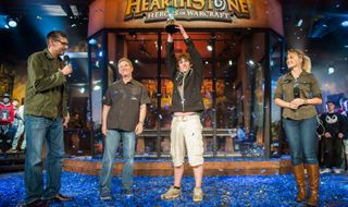 Firebat lifts the Hearthstone World Championship trophy at BlizzCon 2014.