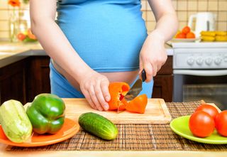 Why is it important to gain weight within the recommended guidelines during pregnancy?