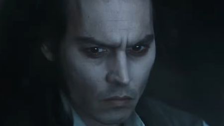 Johnny Depp with a dour expression in Sweeney Todd