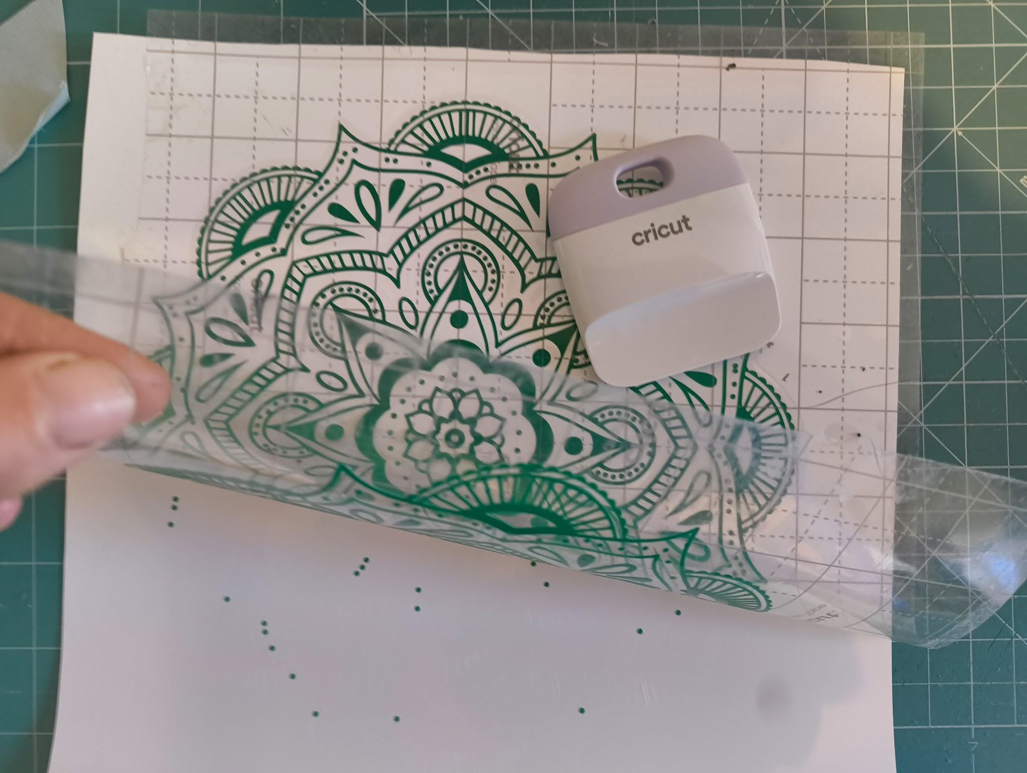 How to use Cricut transfer tape; photos of a person making a print design