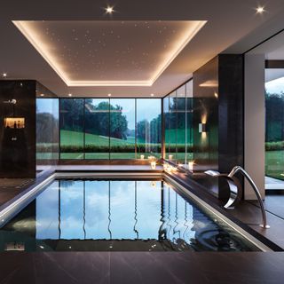 spa pool with glass window and shower