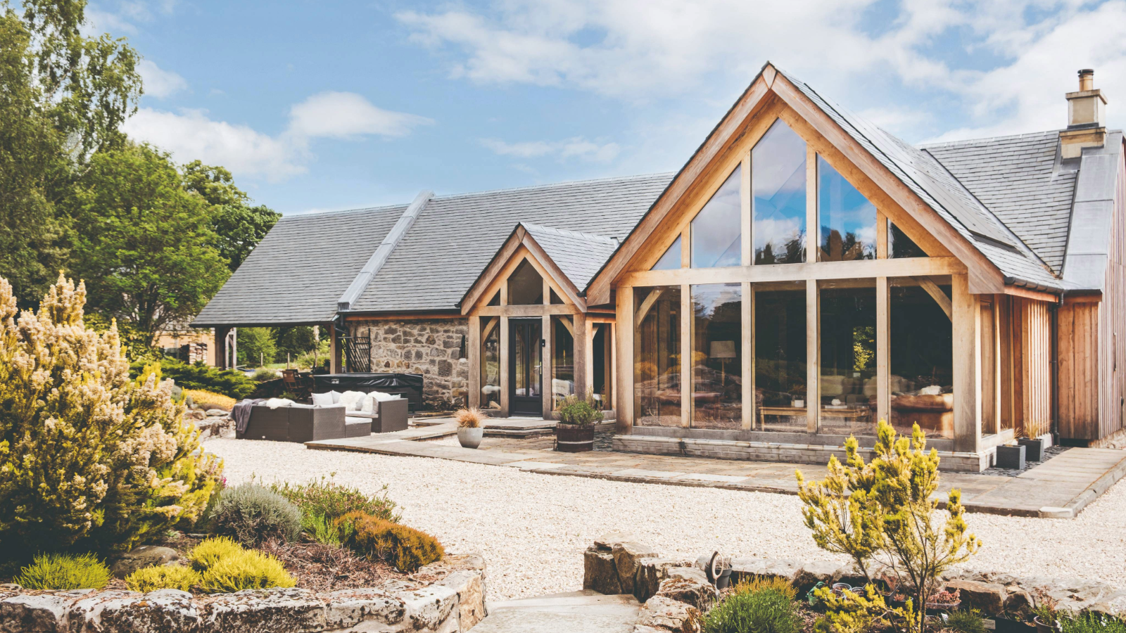 Couple convert run-down barn into modern, oak-framed home