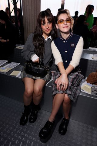 Camila Cabello and Kiernan Shipka attend the Miu Miu Paris Womenswear S/S 2025 show