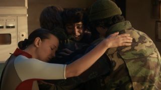 The Party hugging Will after her came out in Stranger Things. 