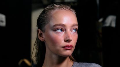 A model backstage ahead of the DI PETSA Spring/Summer 2025 collection, at London Fashion Week in London, on September 13, 2024