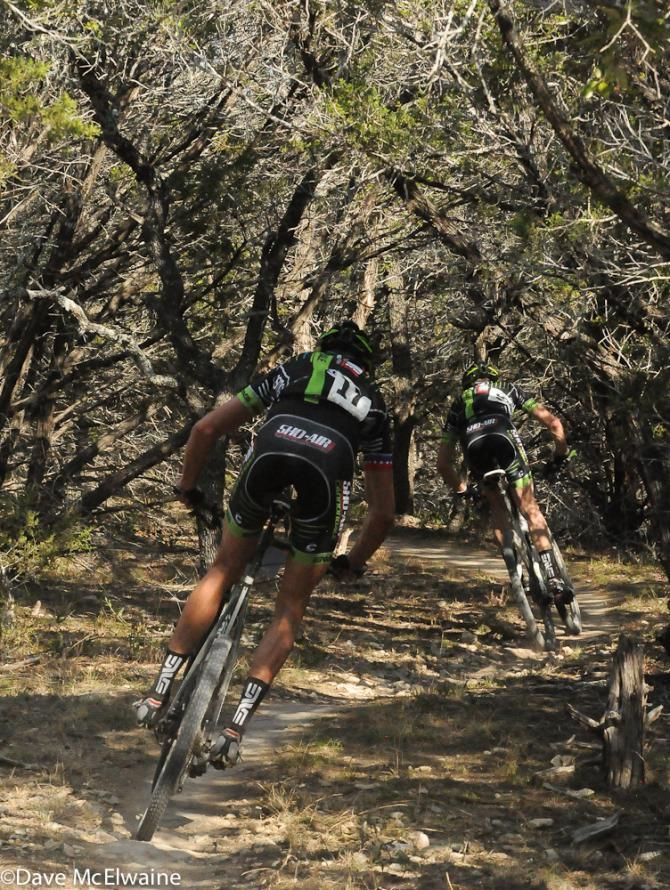 Ryan Trebon (Sho-Air/Cannondale) keeps pace with one of his teammates in the thick forest