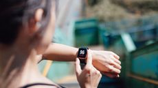 Woman looking at a smart watch