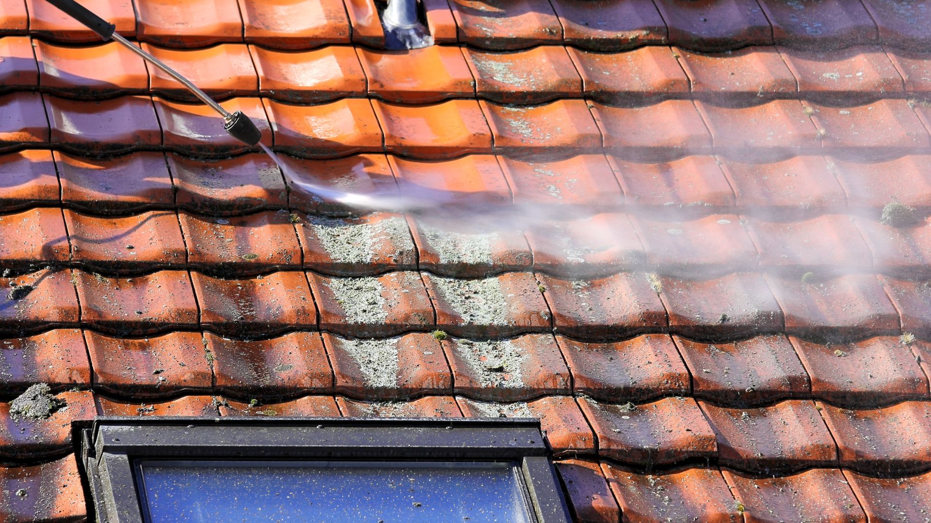 picture of roof being pressure washed