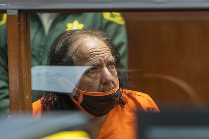 Adult film actor Ron Jeremy listens as his attorney speaks during his arraignment on rape and sexual assault charges at Clara Shortridge Foltz Criminal Justice Center on June 26, 2020 in Los 