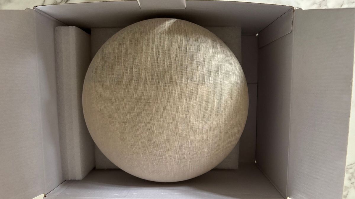 The Dreamegg Sunrise 2 alarm inside its open box during set-up