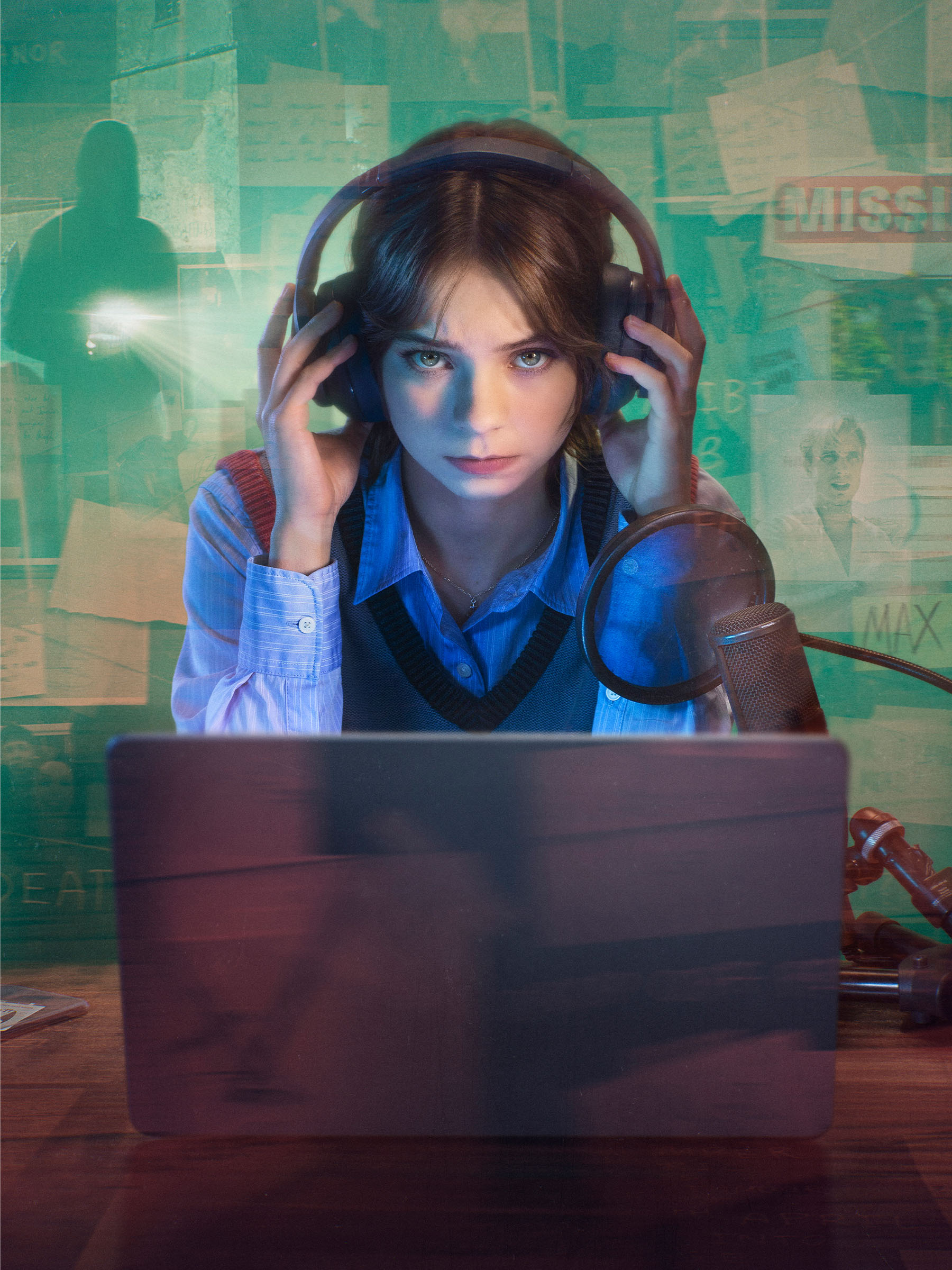 Promo image for season 2 of a Good Girl's Guide to Murder showing Pip sitting in front of a laptop with headphones on an a microphone to her left.
