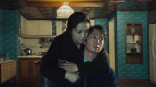 Tang Wei and Park Hae-il in Decision to Leave