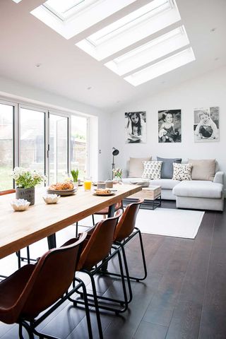 Industrial kitchen extension dining living rooflights with sofa and table