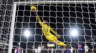 Crystal Palace's Michael Olise scores a last-minute free-kick against Manchester United