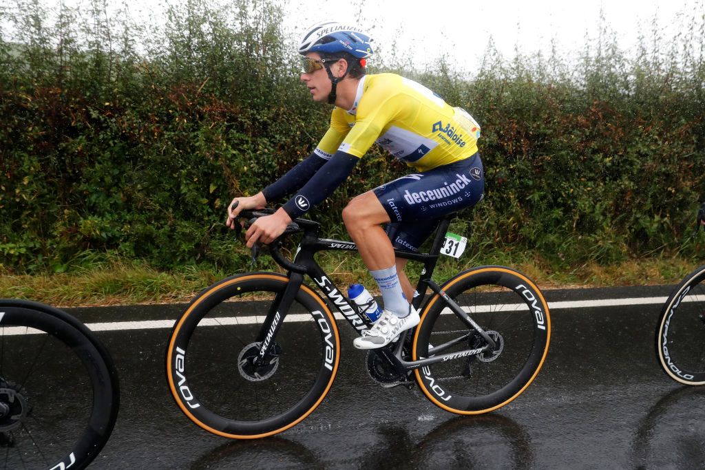 ESCHSURSRE LUXEMBOURG SEPTEMBER 15 Joo Almeida of Portugal and Team Deceuninck QuickStep yellow leader jersey competes in the rain during the 81st SkodaTour De Luxembourg 2021 Stage 2 a 1861km stage from Steinfort to EschSurSre Eschdorf 504m skodatour skodatour on September 15 2021 in EschSurSre Luxembourg Photo by Bas CzerwinskiGetty Images