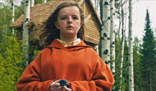 Milly Shapiro as Charlie holding a dead bird in Hereditary