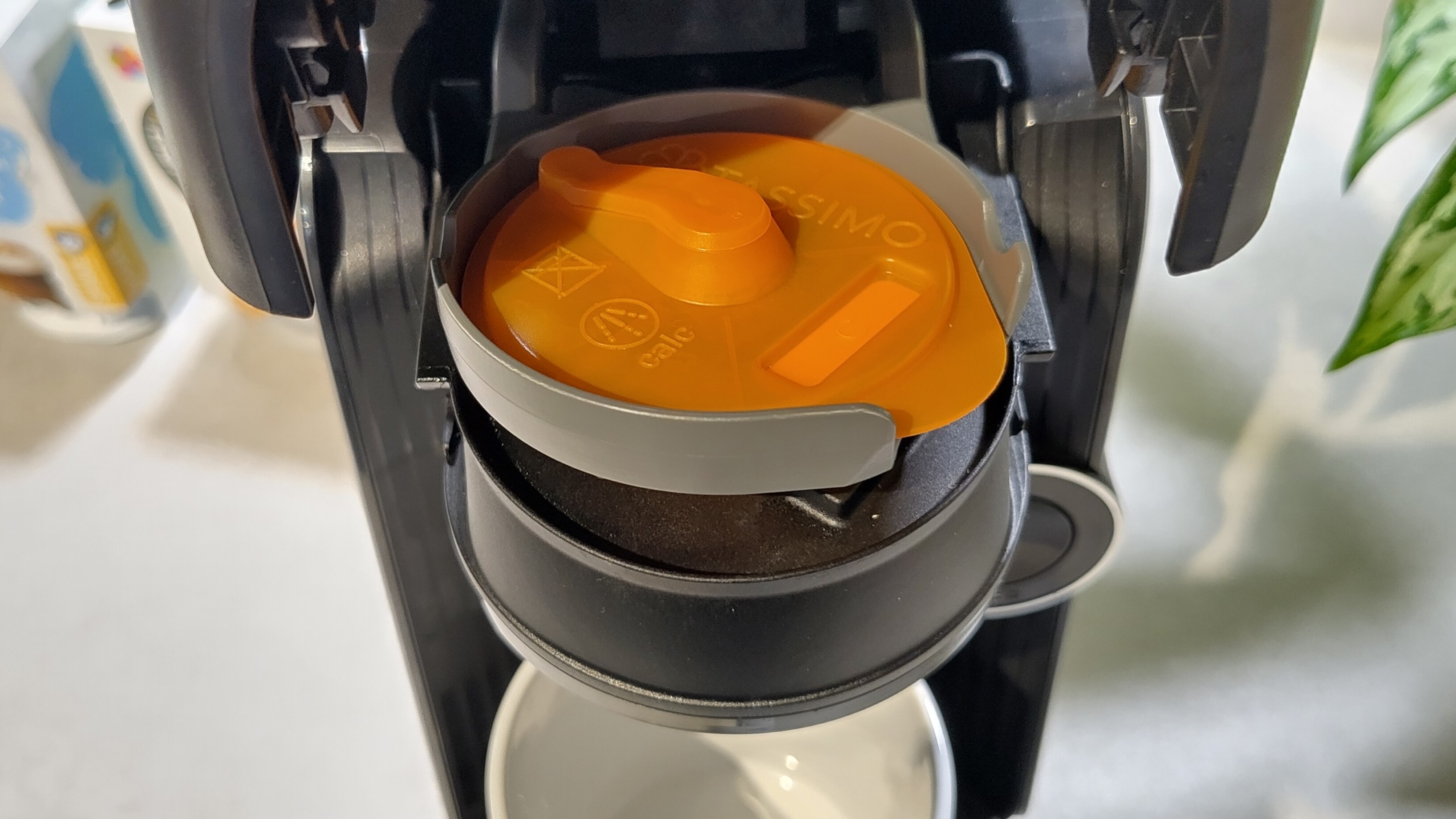 Cleaning disc inserted in Bosch Tassimo Finesse Friendly coffee maker