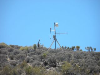 A closed-circuit TV camera watches over the perimeter of Area 51.