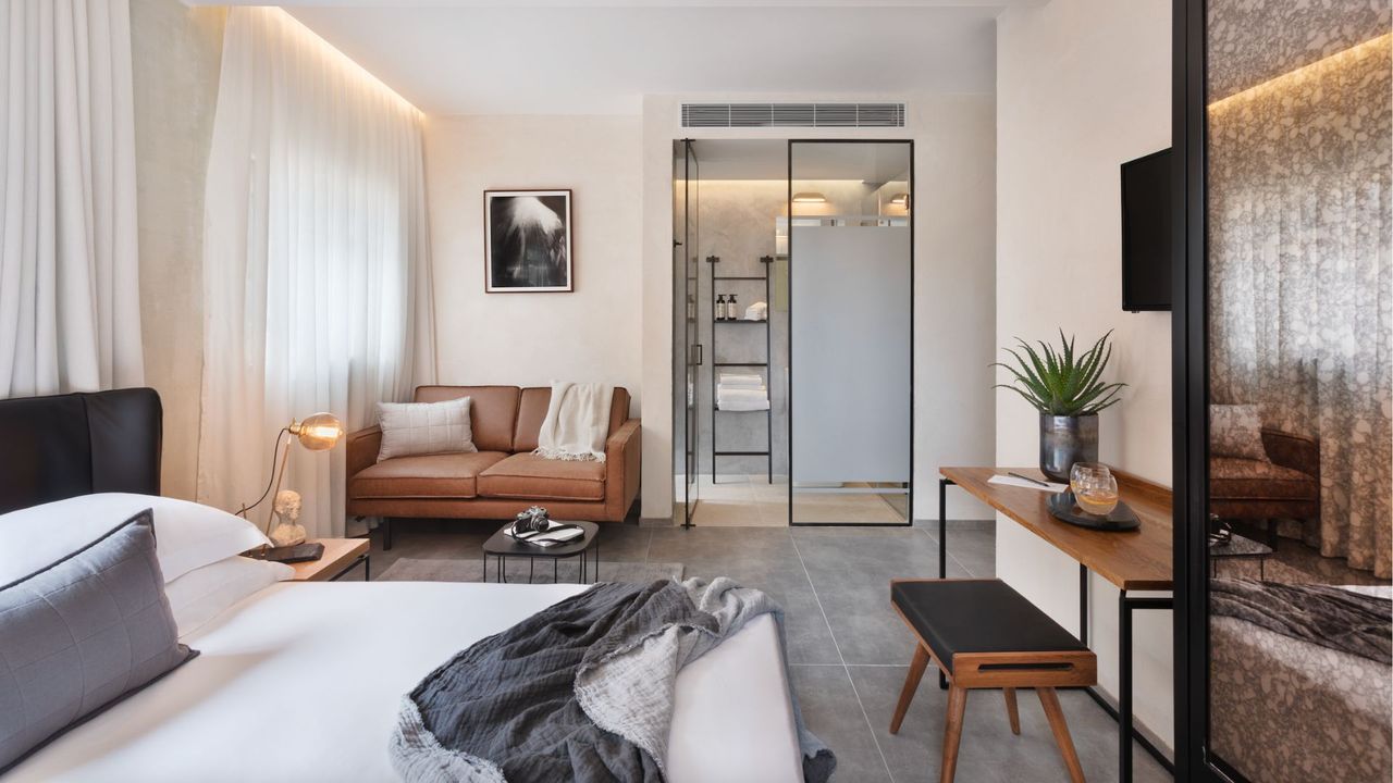 bedroom at the vera hotels, one of the best hotels in israel