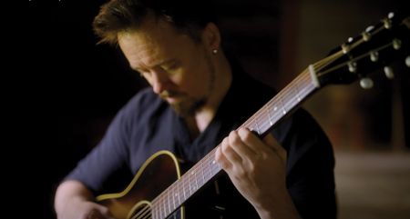 Jussi Reijonen plays fingerstyle on his vintage Gibson acoustic