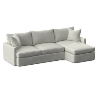 ivory slipcovered sofa