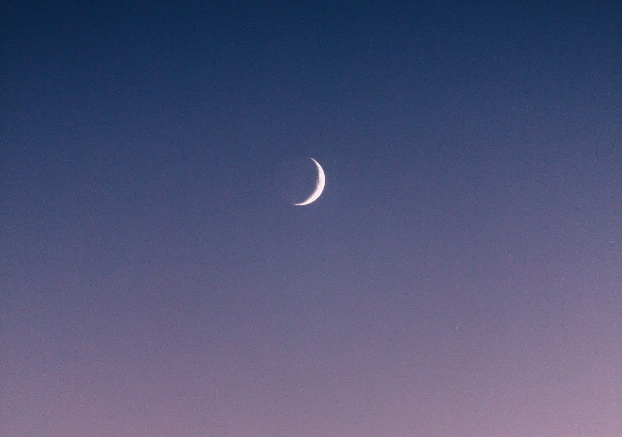 moon in purple sky