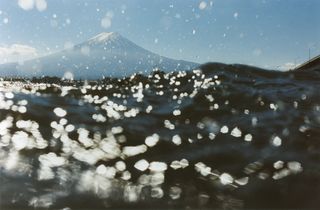 The surface of the lake with Mount Fuji in the background