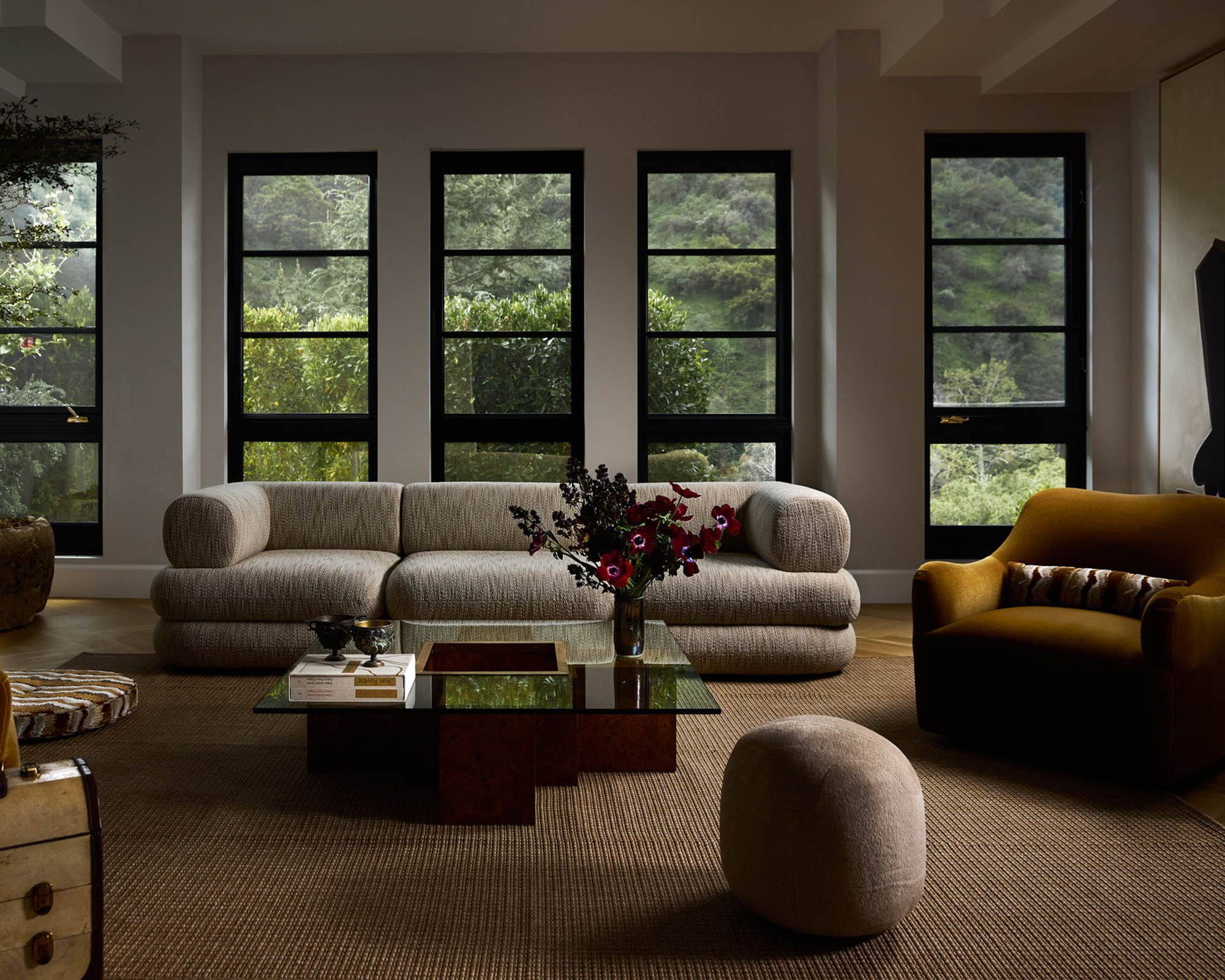 living room with gray rounded sofa